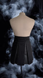 Falda desmontable unitalla color negro.