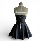 Corset con falda desmontable.